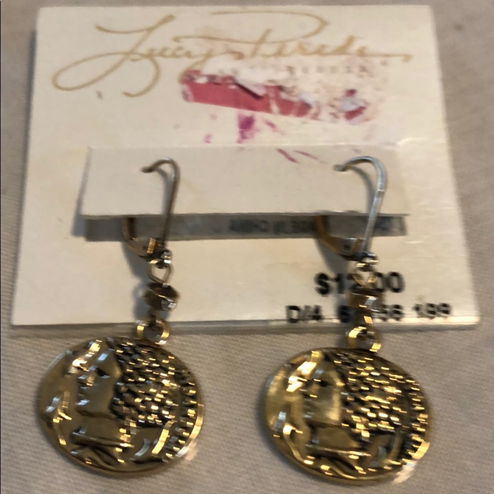 New , tag on earrings, by Lucy Perads